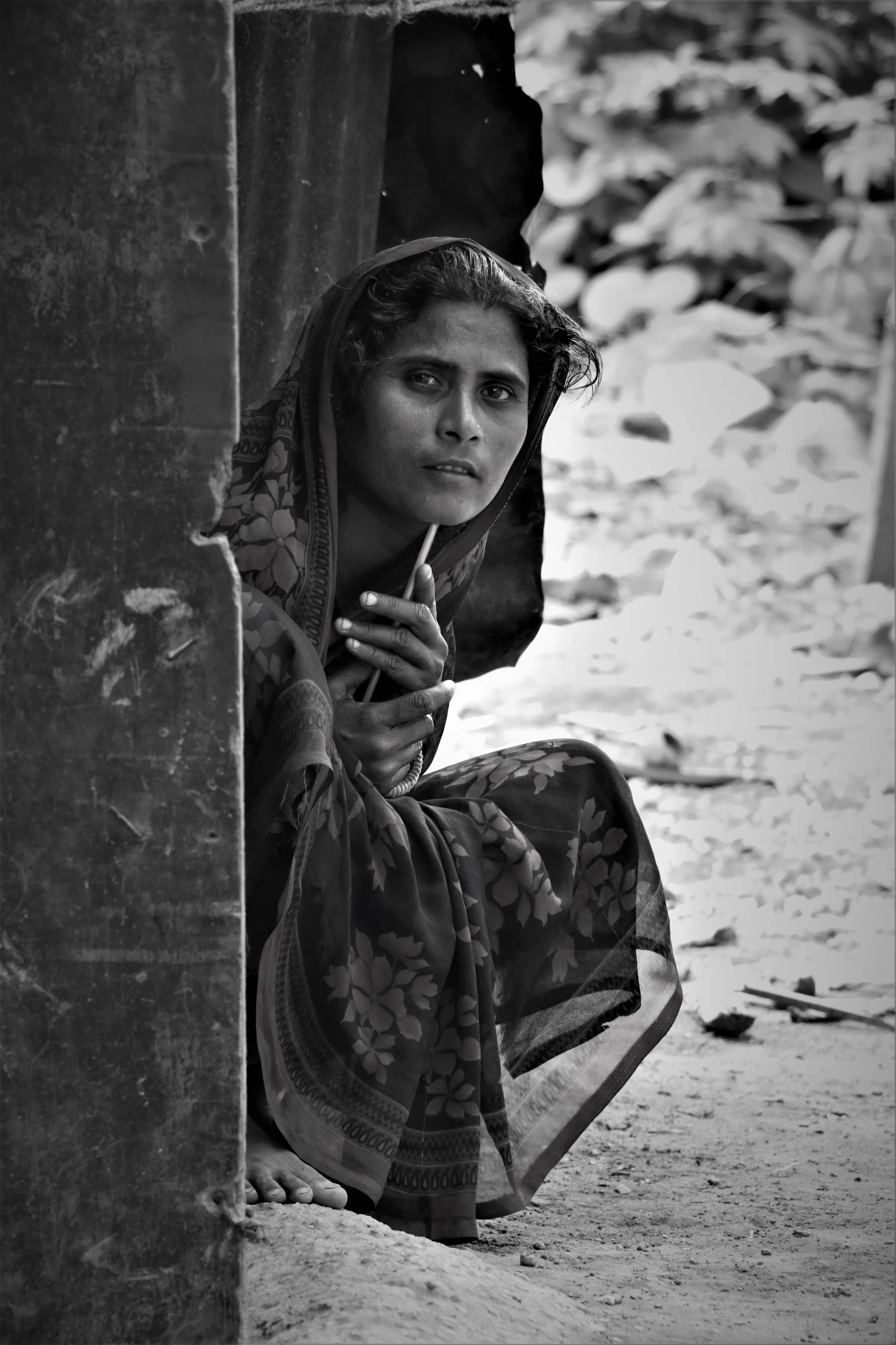 Students holding books together in a classroom.