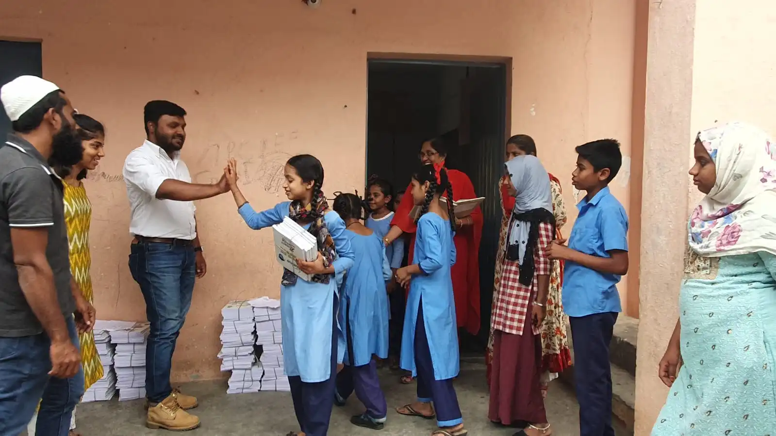 High-fives over fresh school supplies