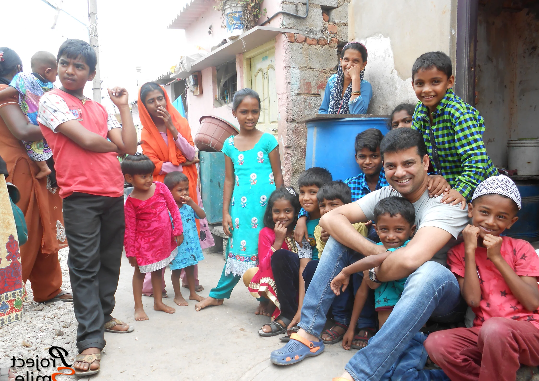 Children standing together outdoors in their neighborhood.