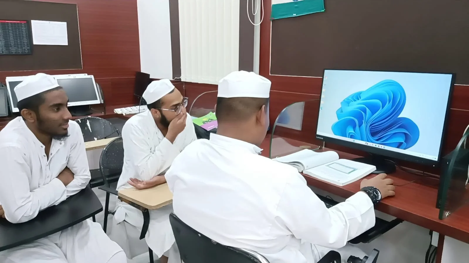 Community members gathered in a warm event space.